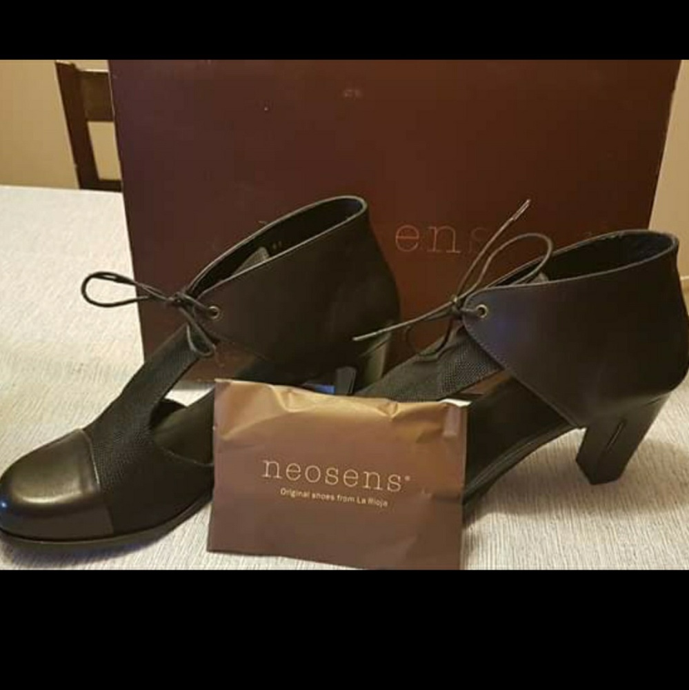 New, with box and leather cleaning kit